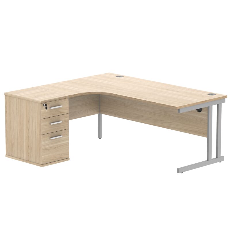 Double Upright Left Hand Radial Desk + Desk High Pedestal | 600mm Deep Pedestal | 1800X1200 | Canadian Oak/Silver