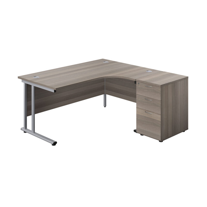 Twin Upright Right Hand Radial Desk + Desk High 3 Drawer Pedestal | 1600X1200 | 600mm Deep Pedestal | Grey Oak/Silver